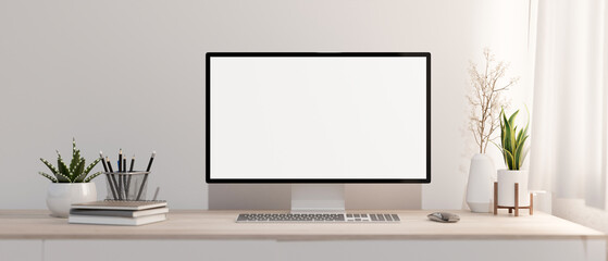 A minimalist white home office with a PC computer mockup on a wood table against the white wall.