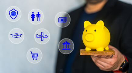 Businessman show the piggy bank with many icon for planning and saving. Family finance plan...