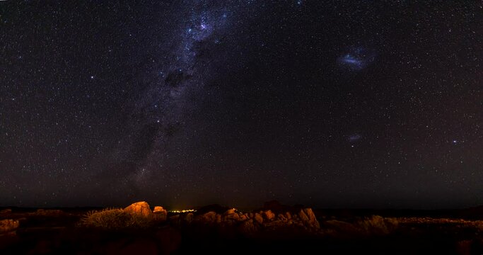 Day to night time-lapse movie of the starry sky and the Milky Way taken in Namibia