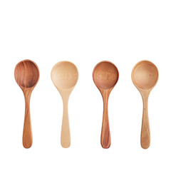 Four wooden spoons lined up on transparent background