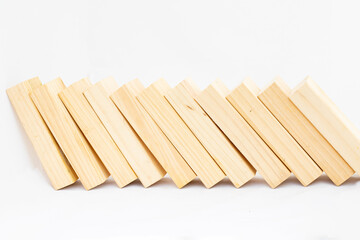 Set of blank wooden domino isolated on white background. Domino effect concept. Copy space.