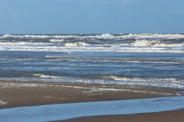 Waves in the rough North sea close to the beach