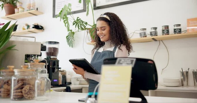 Woman, cafe and barista with order on tablet for sale, ecommerce and service at coffee shop. Female person, networking and waitress with technology for website, communication or online menu update