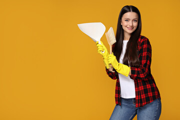 Housewife, in rubber gloves, on a bright background.