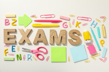 Exam, inscription on the table, on a light background.