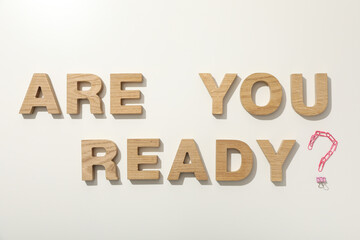 Inscription: "Are you ready?", on the table, top view.