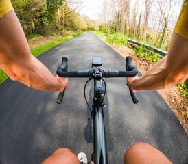 Cyclist's pov riding on picturesque road - 776989678