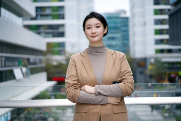 Confident Professional Woman in Modern Urban Environment
