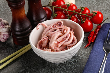 Delicous marinated squid tentacles in the bowl