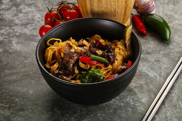 Asian wok with noodle, vegetables and beef