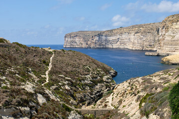 Fototapeta na wymiar Kantra Valley is a beautiful small inlet next to the main bay of Xlendi - Xlendi, Malta