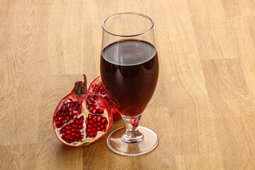 Sweet pomegranate juice in glass