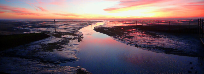 wonderful sunset over the pass of the marina of Andernos-les-Bains, on the Arcachon basin in the...