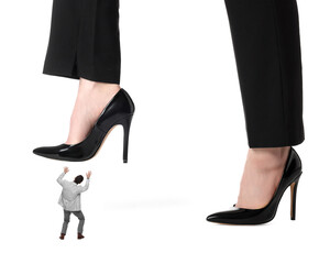 Big woman stepping onto small man on white background