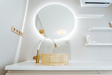 a bathroom with a sink , mirror and air conditioner