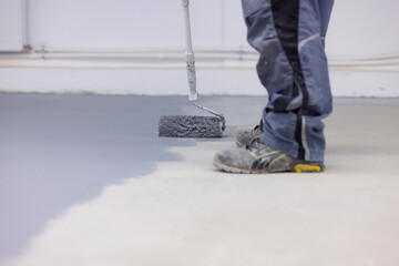 Precision Work on Self-Levelling Epoxy Floors, Close-up of Charcoal Roller