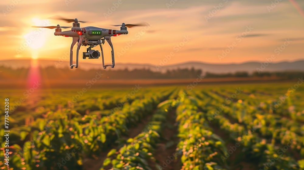 Poster a drone is flying over a field of green plants. the drone is equipped with a camera and is capturing