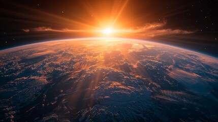 The sun is shining brightly on the surface of the Earth, creating a warm and inviting atmosphere. The image captures the beauty of the planet and the sun's rays, highlighting the vastness of space