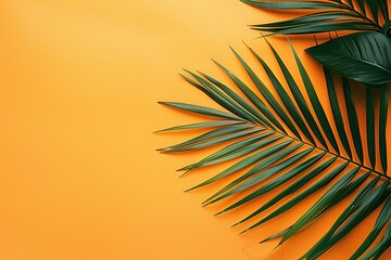 Palm Leaves on yellow solid color. Tropical palm leaf on orange background. Creative nature layout. Flat lay. Summer design concept. Botanical frame, wedding invitation, holiday branding. Copy space