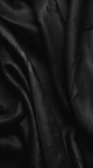 A detailed shot of elegant black leather with natural folds, emphasizing texture and luxury. Velvety alcantara texture - obrazy, fototapety, plakaty