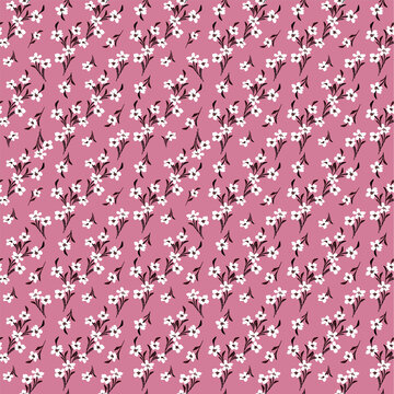 Floral seamless pattern. Pretty flowers on light pink background. Printing with small white flowers. Ditsy print. Seamless vector texture. Spring bouquet.
