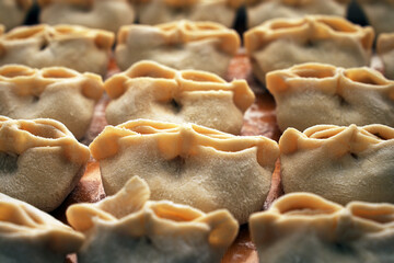 Traditional dumplings, asian food, manty or dim sum stuffed with meat - 777064034