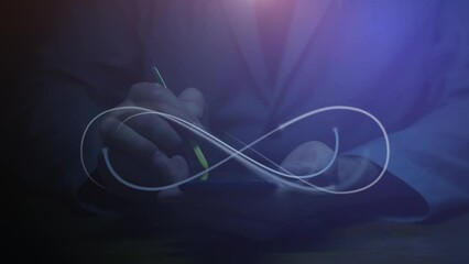 An animated infinity symbol against the background of a silhouette of a person using a smartphone with a stylus. The effect of limitlessness. Cg