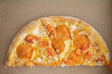 Pizza Pepperoni in a carton box. view from above. High quality photo