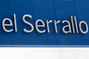 The image shows the text el serrallo, in white 3D letters on a vibrant blue background. El Serrallo is a well-known maritime district of the city of Tarragona, which makes.