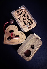 Entertaining toys and games with skill: wooden brain teaser puzzles