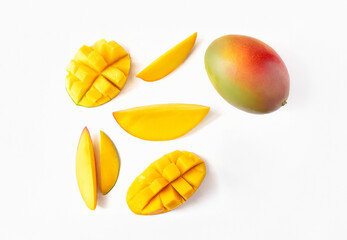 Picture ripe mango slices neatly arranged, each piece isolated against a pristine white background."
