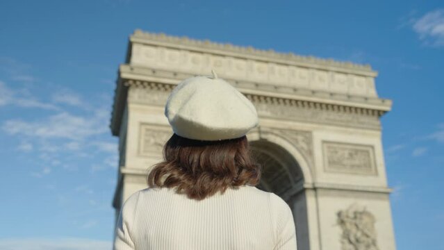 Woman at Arc de Triomphe