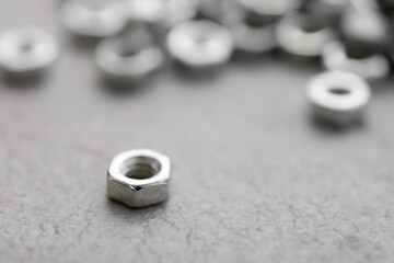 Metal nuts group on a table - 777171219
