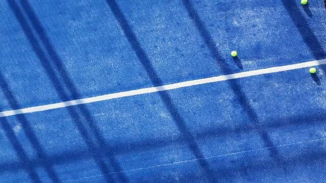 drone video, ascending footage on a paddle tennis court, sport court concept
