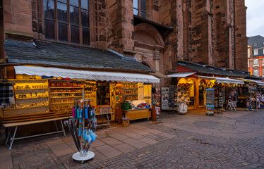 Small souvenir shops around the Holy Ghost church in Heidelberg. Baden Wuerttemberg, Germany, Europe. - obrazy, fototapety, plakaty