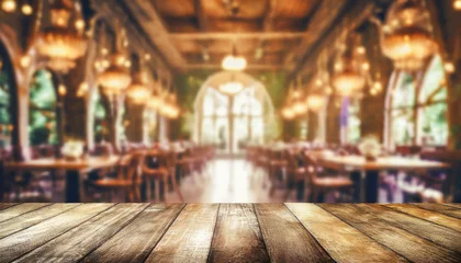 Tischdecke empty wood table top on blur light gold bokeh of cafe restaurant in dark background © netsay