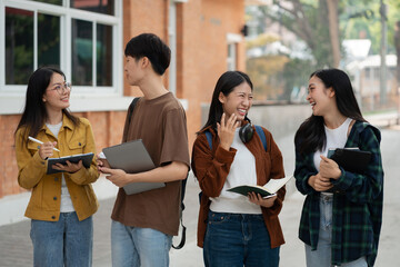 Group of students with books preparing for exams during holidays.