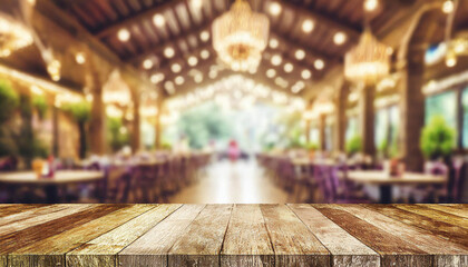 empty wood table top on blur light gold bokeh of cafe restaurant in dark background