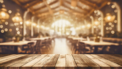 empty wood table top on blur light gold bokeh of cafe restaurant in dark background - obrazy, fototapety, plakaty