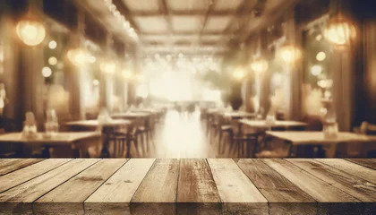 Foto auf Glas empty wood table top on blur light gold bokeh of cafe restaurant in dark background © netsay