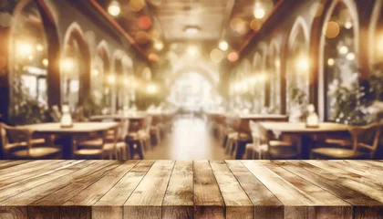 Gardinen empty wood table top on blur light gold bokeh of cafe restaurant in dark background © netsay