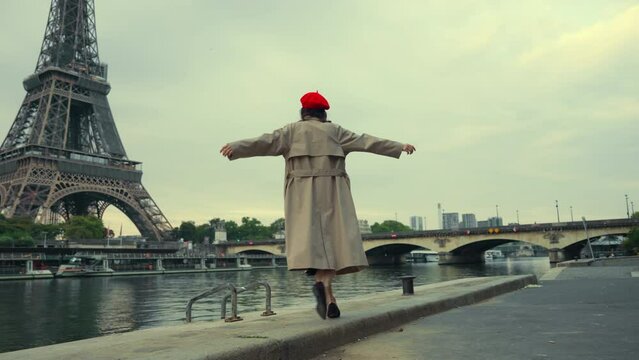 Woman in Red Beret by the Eiffel Tower