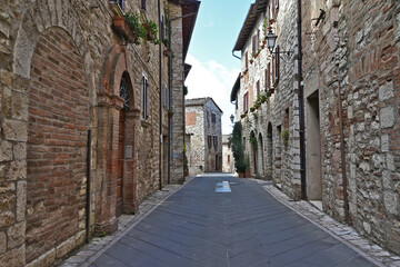 Fototapeta na wymiar Corciano, vicoli, strade, case del vecchio borgo - Perugia, Umbria