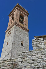 Fototapeta na wymiar Corciano, la chiesa dell'Assunta e campanile nel vecchio borgo - Perugia, Umbria