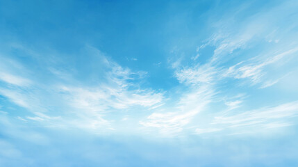 Fototapeta premium Summer blue sky with beautiful smooth motion clouds.