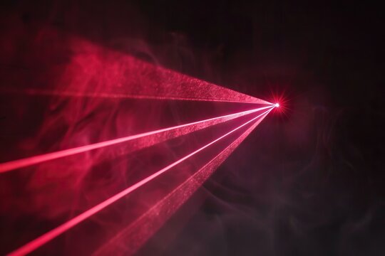 Red laser beam light effect on black background