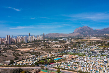 Aerial photo of the town of Benidorm in Spain showing a drone view of a camp site with many...