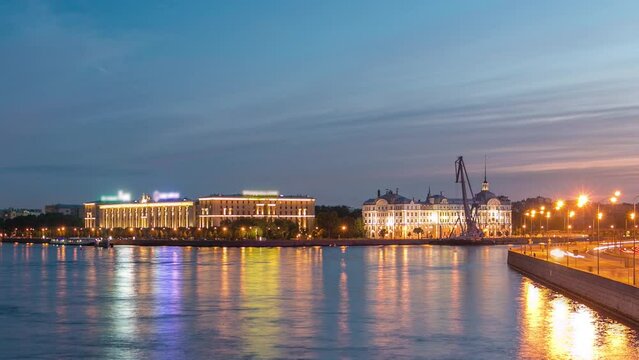 Day to night timelapse showcases Nakhimov Naval School and Peter and Paul Fortress, viewed from Liteyniy Bridge in St. Petersburg. Aurora's absence, reflected in Neva's waters, adds to the spectacle