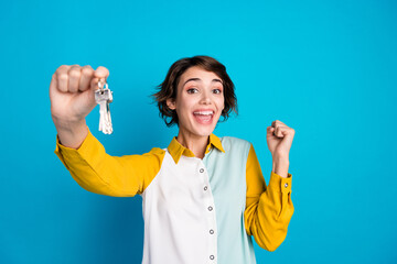 Photo of winning in lottery big cottage house keys young funny woman celebrate best prize for her...