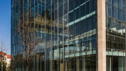 Reflective glass building exterior at dusk